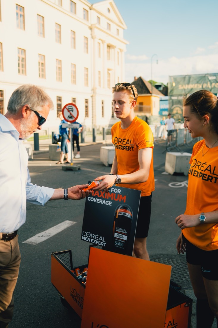 Refresh Squad handing out samples